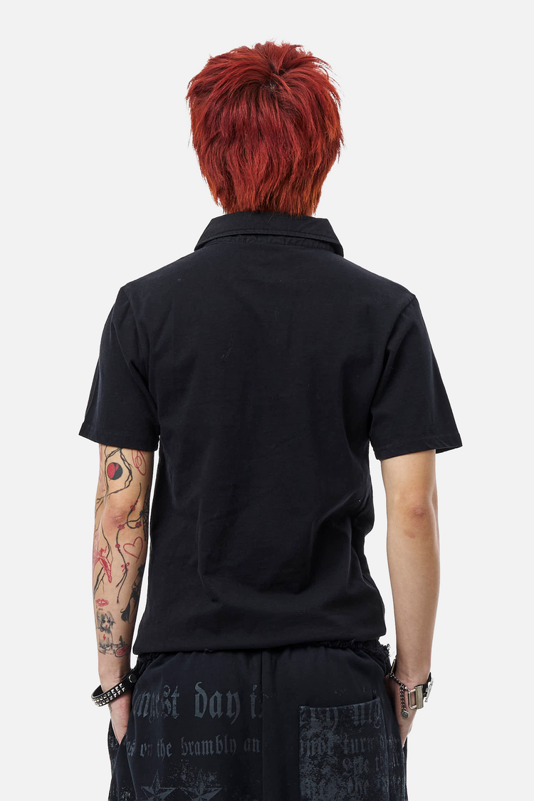 Back view of the Black Thorns Polo, plain black with short sleeves and collar