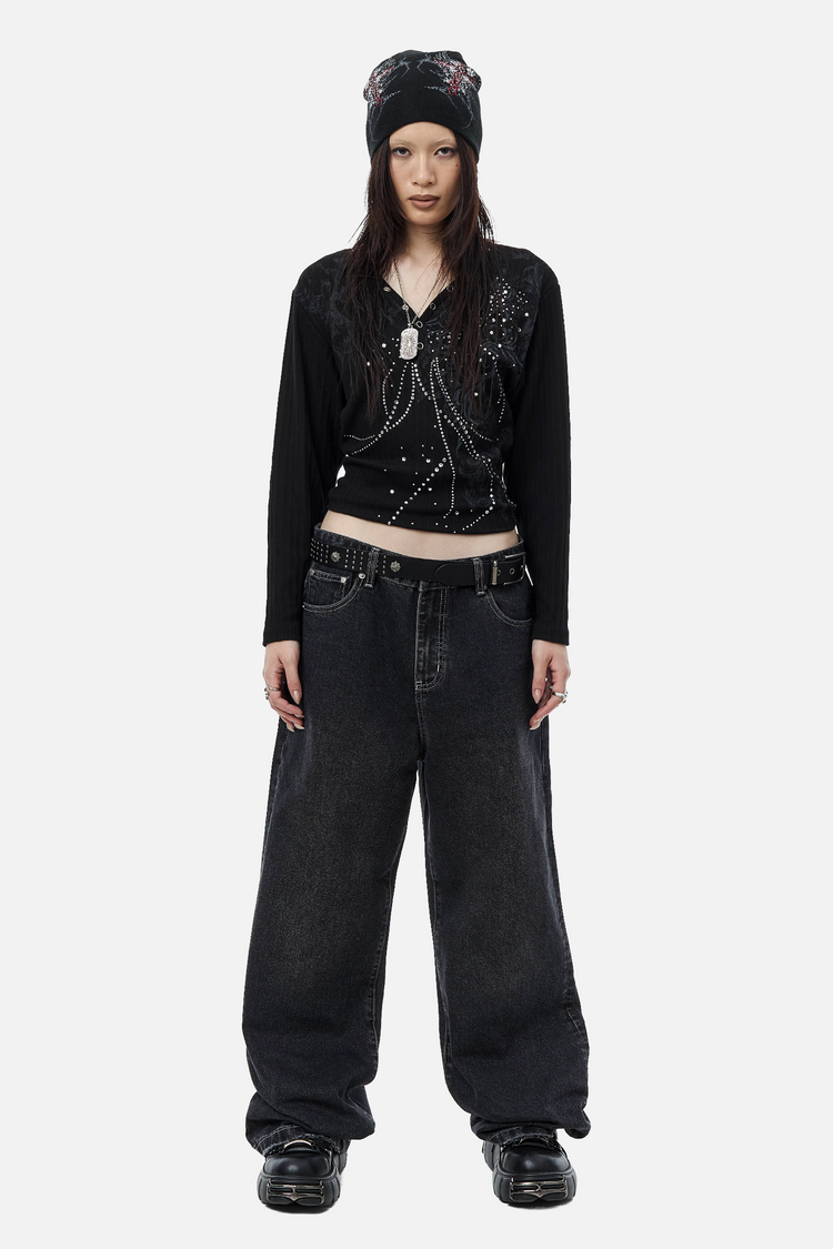Full-length front view of the cropped Fate Ribbed Long Sleeve and wide-leg jeans