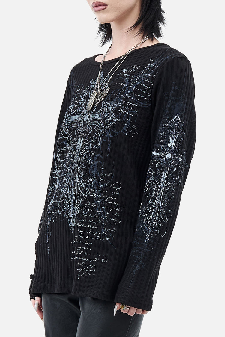 Side angle of the Scripture Ribbed Long Sleeve showing the cross print on the sleeve