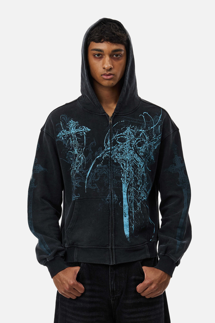 Model wearing the black Blade Hoodie zipped with the hood up, blue gothic sword print on front