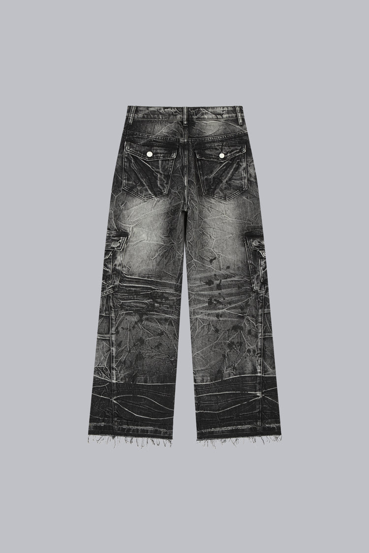 Fractured Denim laid flat, back view, showing crinkle wash and raw frayed hems