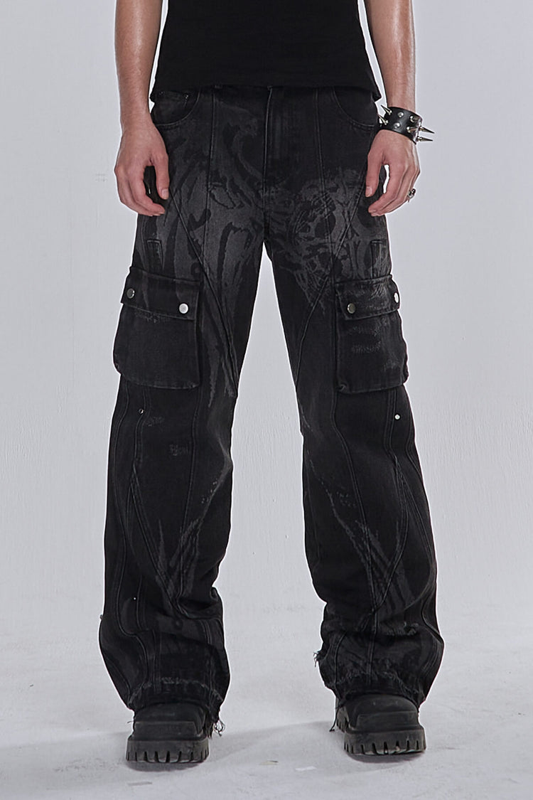 Front view of the washed black Destroyer Denim cargo jeans with black lug-sole boots