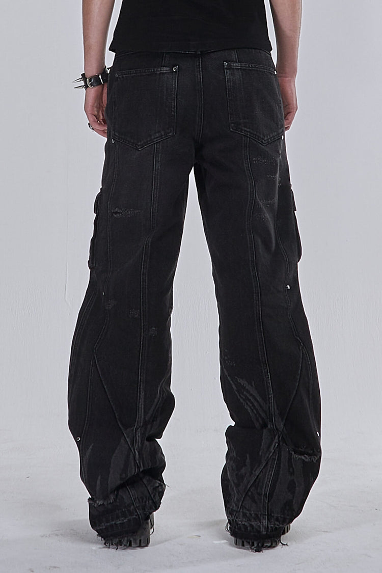 Back view of the Destroyer Denim showing the paneled seams and frayed hems