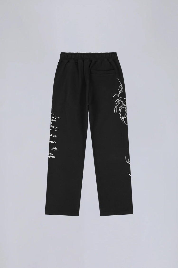 Sigil Sweatpants laid flat, back view, with embroidery down both legs