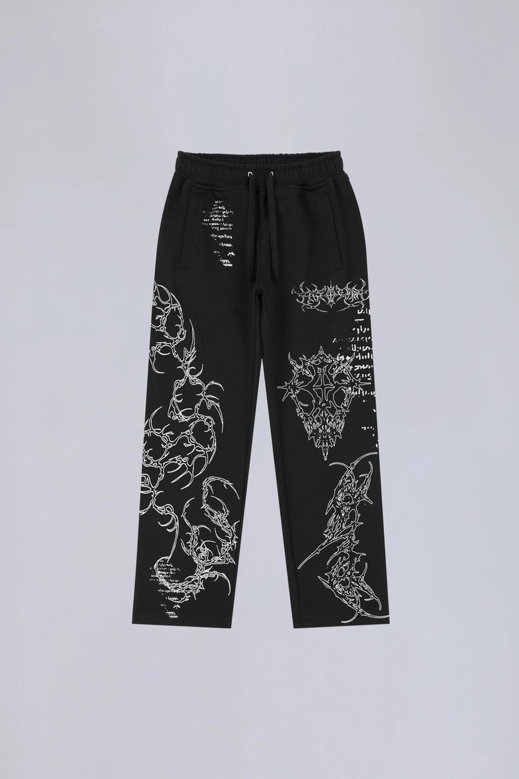 Sigil Sweatpants laid flat, front view, black with silver tribal and gothic script embroidery