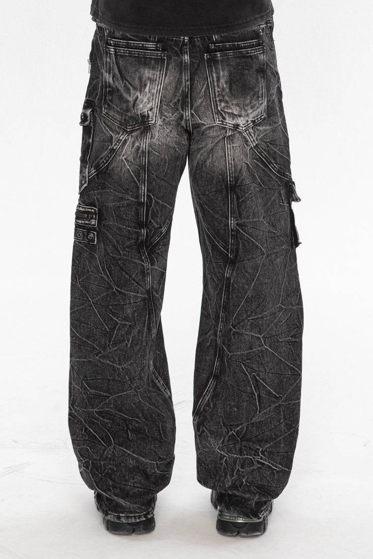 Back view of the Utility Denim showing the crinkled black wash and cargo pockets