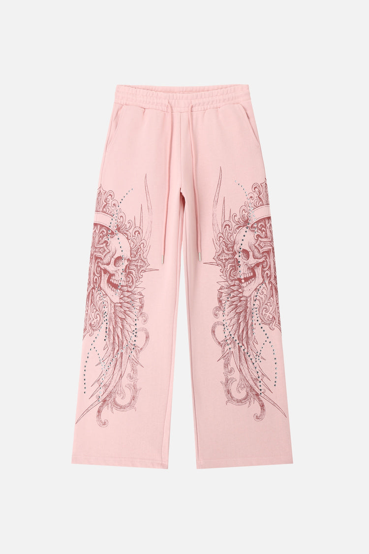 Pink Bonnie Sweatpants laid flat, front view with burgundy skull and wing graphics