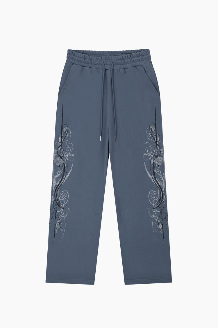 Front of the Midnight Blue Crux Sweatpants laid flat with embroidered side designs