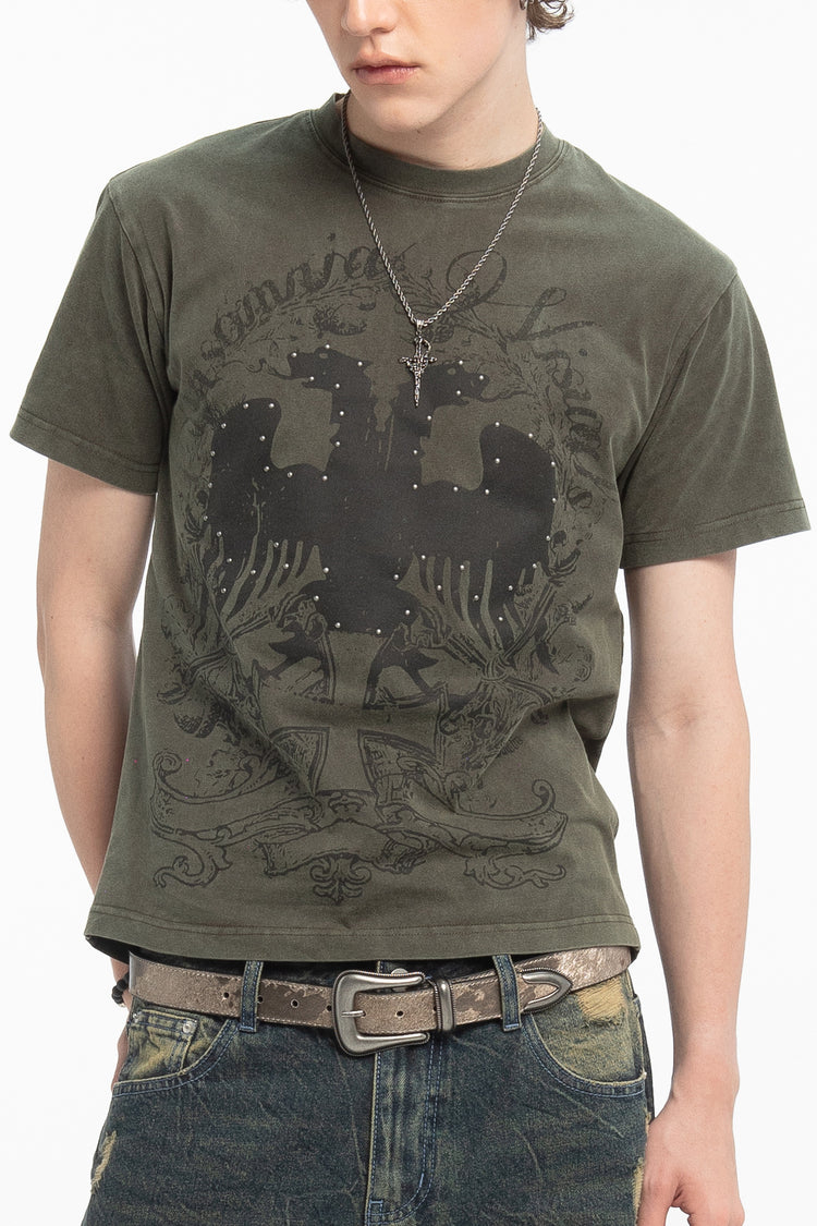 Model wearing the olive Studded Wings Tee with black double eagle print and silver studs