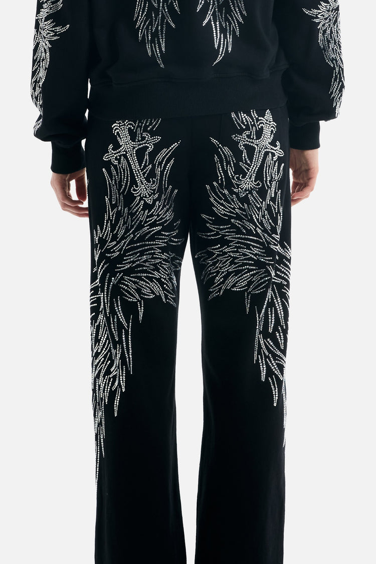Close back view of the All Over Wings Rhinestone Sweatpants showing rhinestone crosses and wings