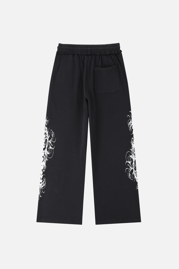 Eternal Sweatpants laid flat, back view, with back pocket and white leg print