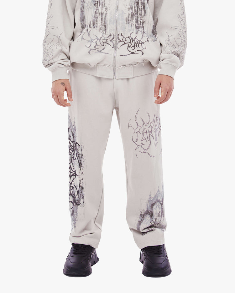 Gray Cathedral Sweatpants worn with matching hoodie and black sneakers, front view from waist down