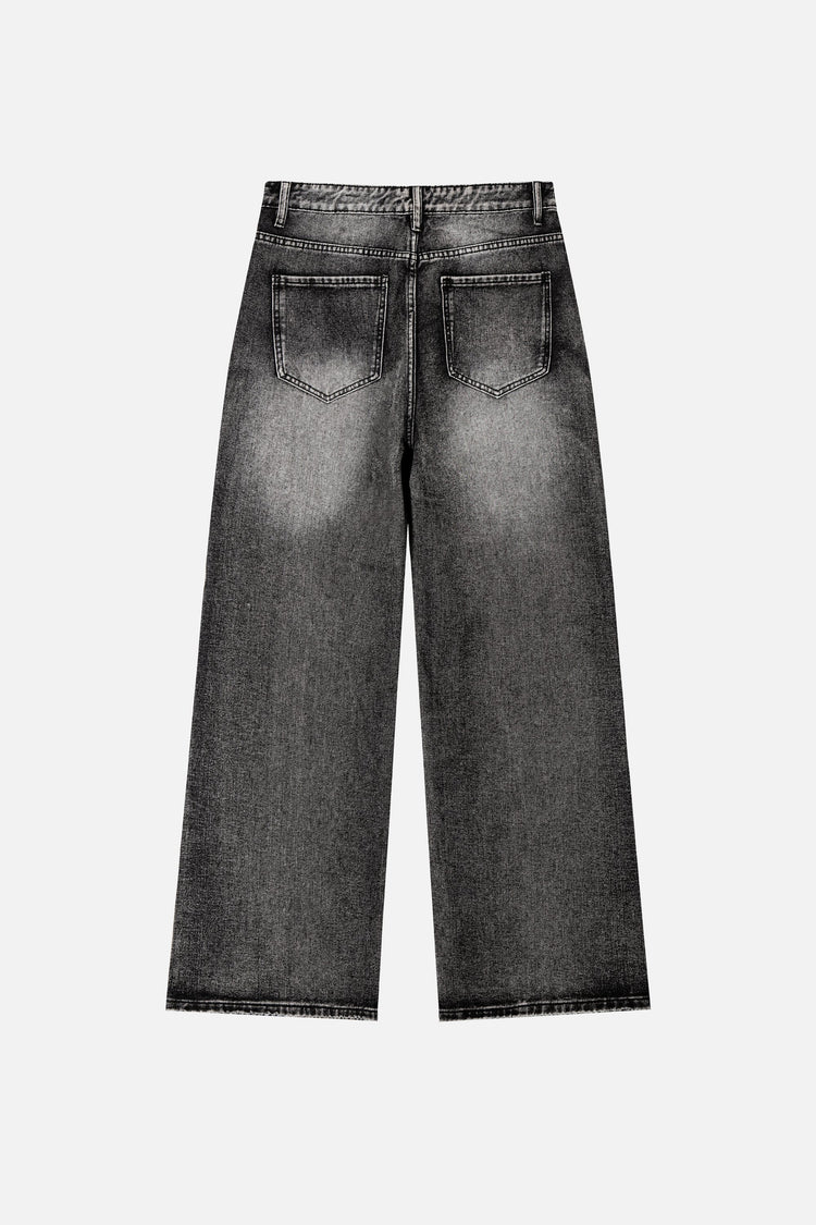 Back of the Washed Black Outlaw Denim laid flat, with faded wash across the seat