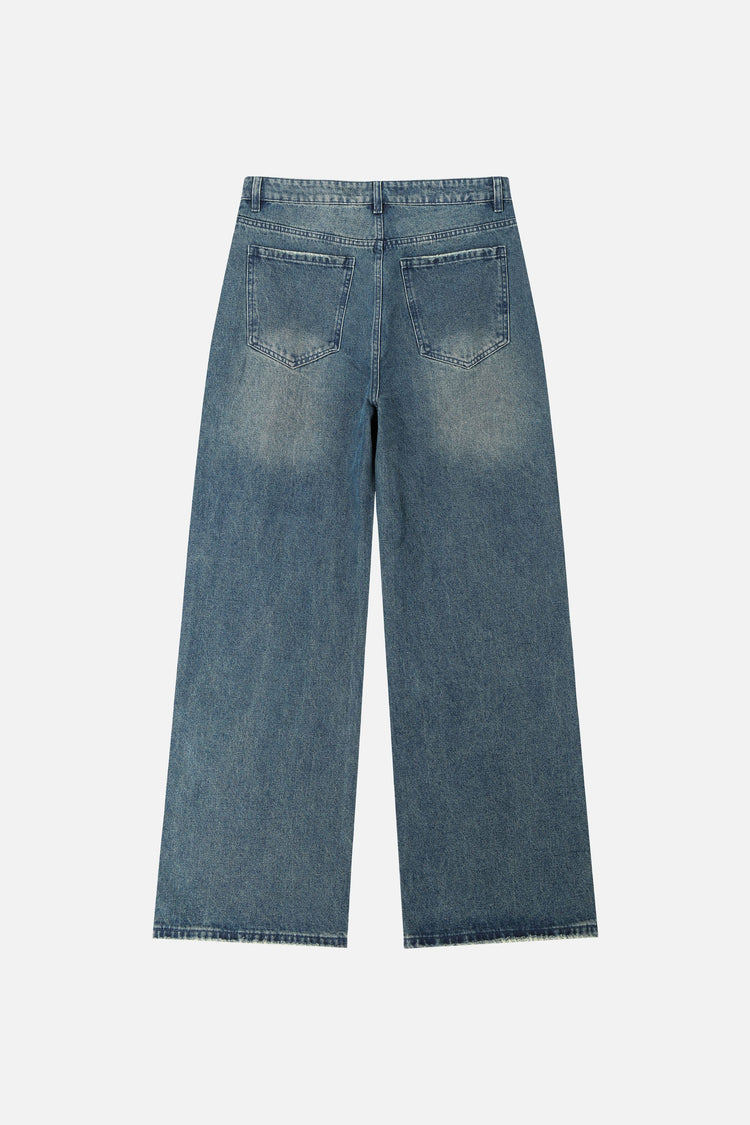Back of the Washed Blue Outlaw Denim laid flat with faded back pockets