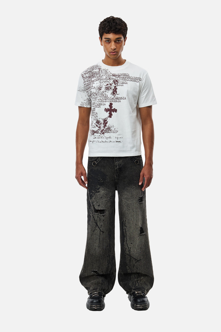 Model in the White Messages Tee with distressed charcoal jeans, full-length front view