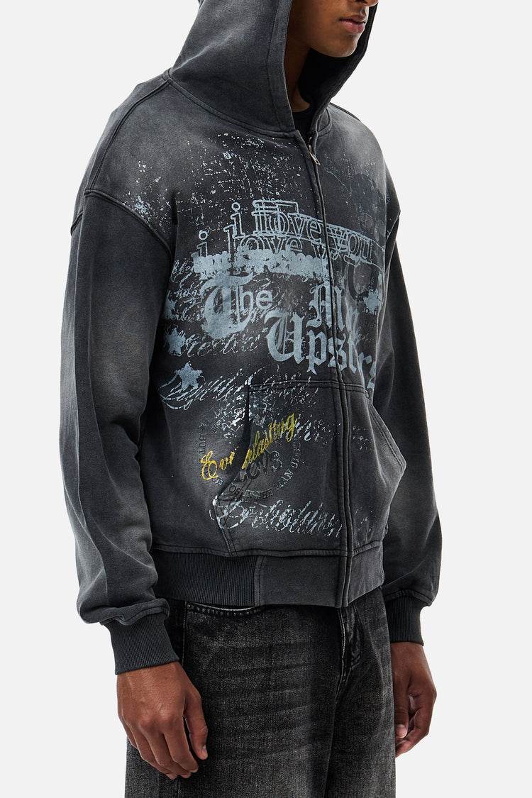 Three-quarter close-up of the Upstairs Zip Hoodie print on the chest and sleeve