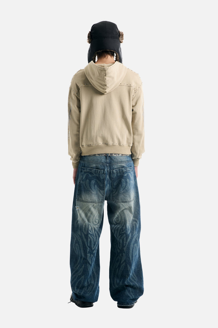 Full-length back view of the IVLA Zip Up Hoodie with baggy faded blue jeans