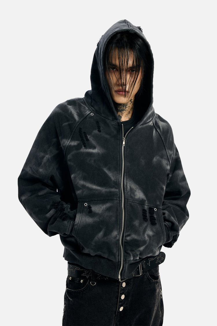 Model wearing the Studded Raglan Zip Up Hoodie with hood up, hands in pockets