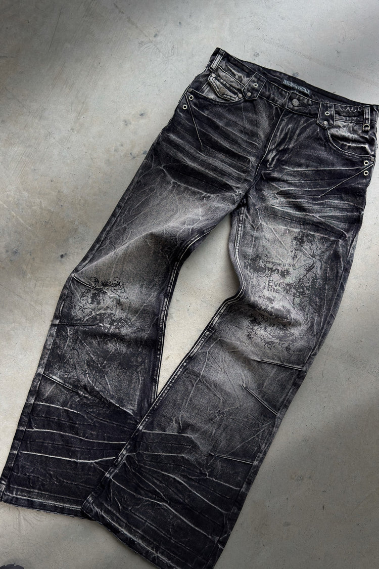 Scripture Rogue Denim V2 laid flat on concrete