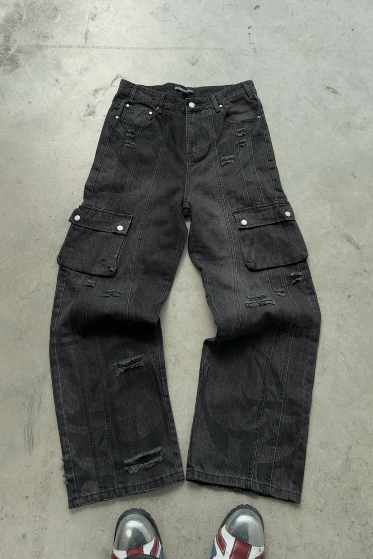 Tribal Destroyer Denim laid flat on concrete
