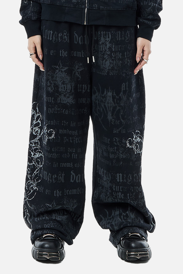 Front view of the wide-leg Sacred Sweatpants with matching zip hoodie and platform shoes