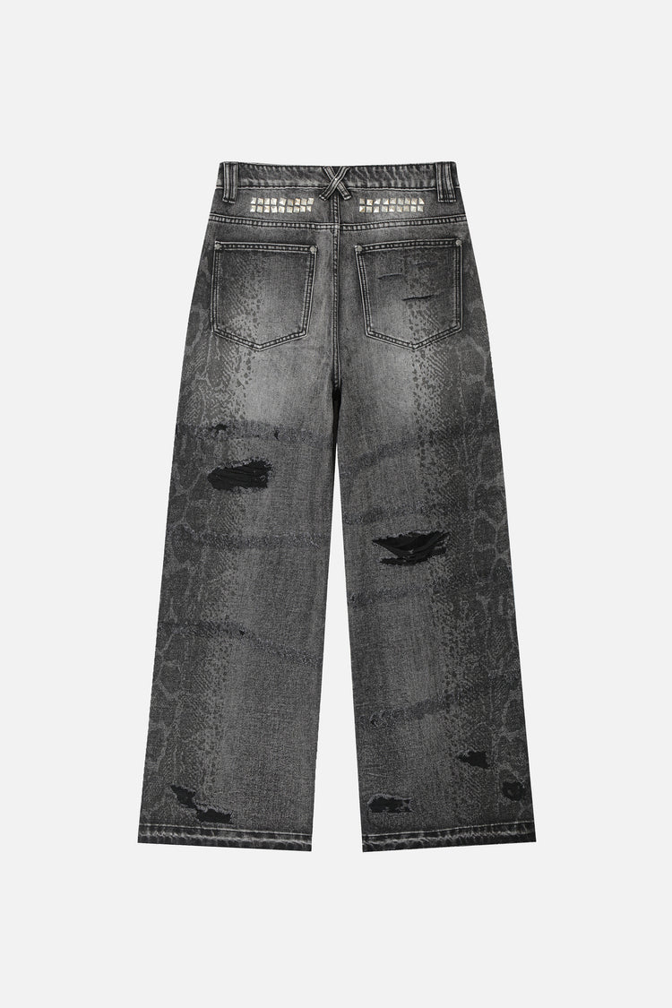 Snakeskin Destroyer Denim V2 laid flat, back view, with studded waistband and distressed knees