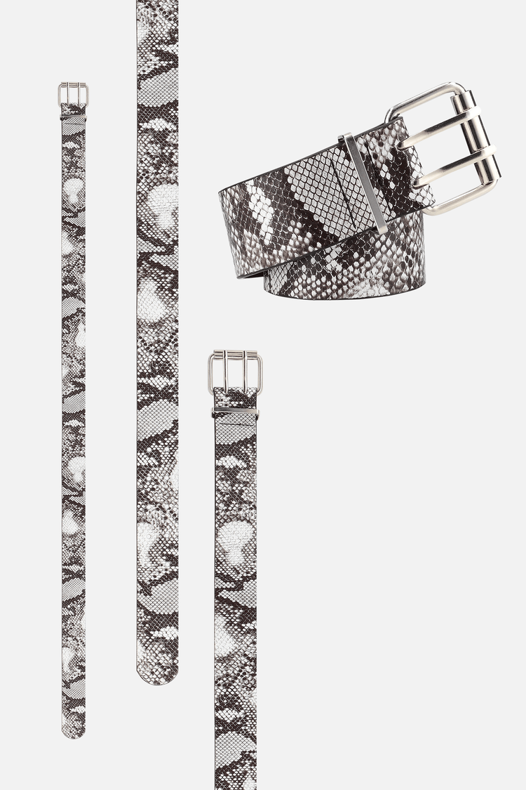 Snakeskin Belt shown full length and coiled, grey python print with silver buckle