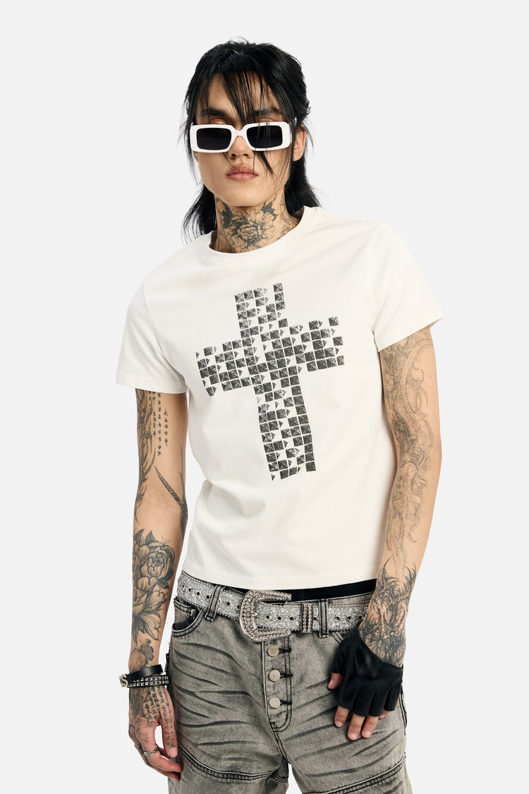 Model in white sunglasses wearing the White Pyramid Stud Cropped Tee with studded cross