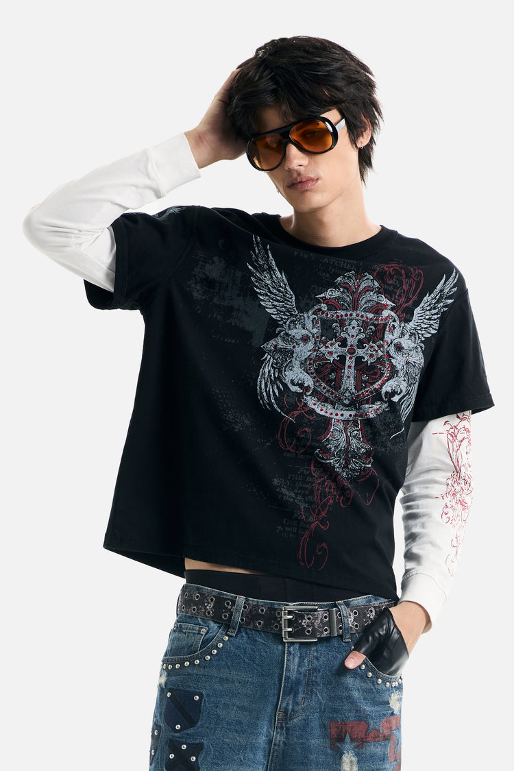 Model with hand in hair wearing the Winged Cross Rhinestone 2FER and studded belt
