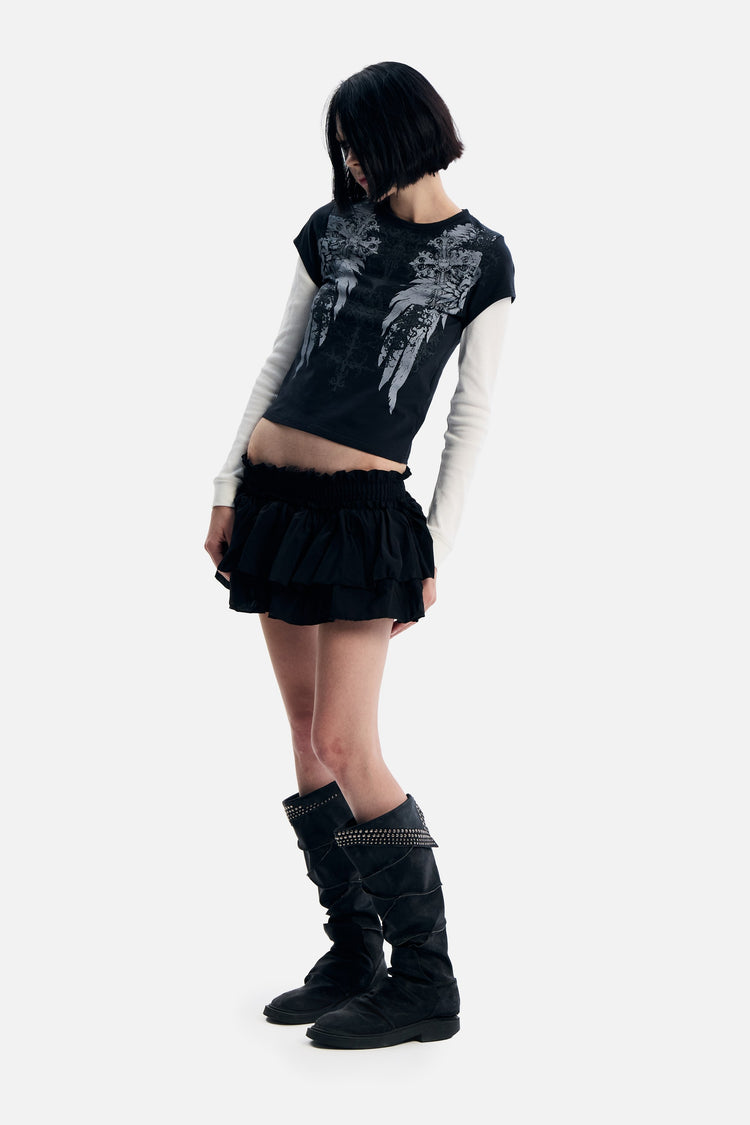 Side view of the Wings 2fer Womens Long Sleeve with knee-high boots