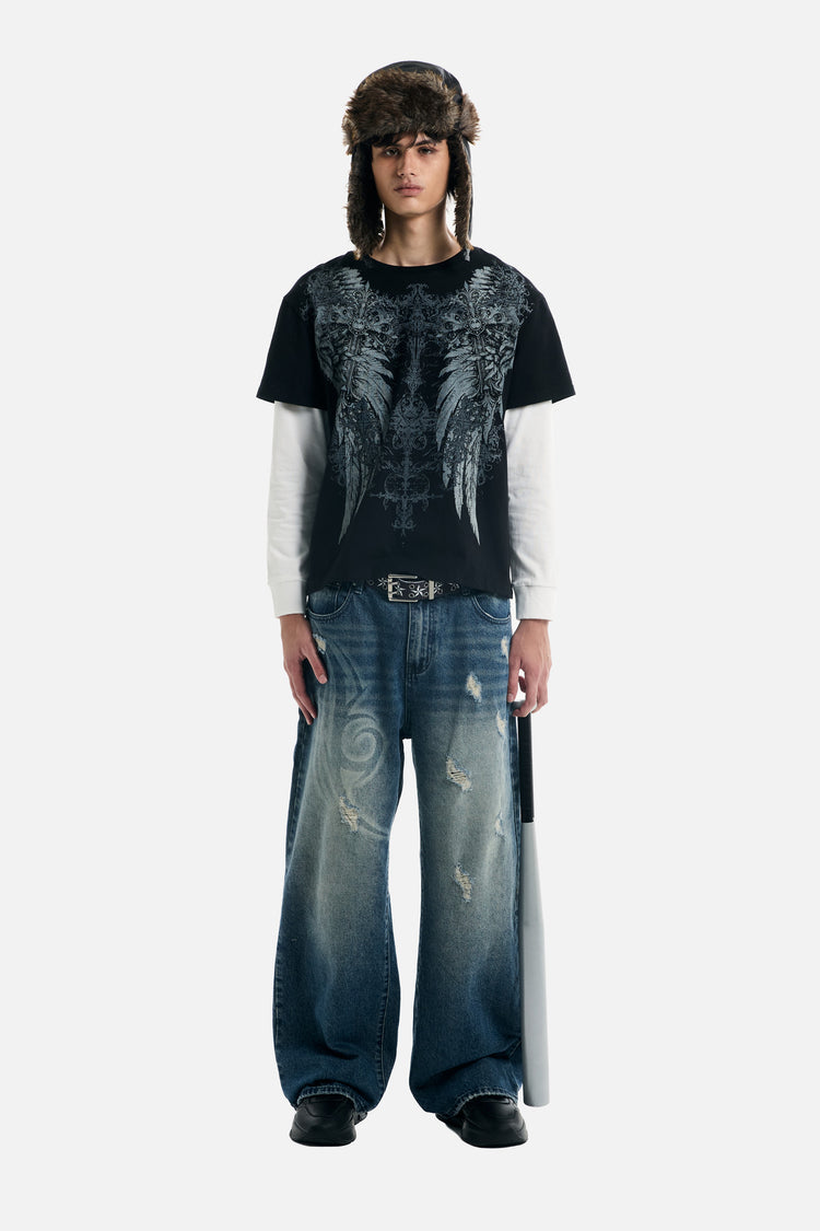 Full-length front view of the Wings 2Fer with white undersleeves and baggy faded jeans