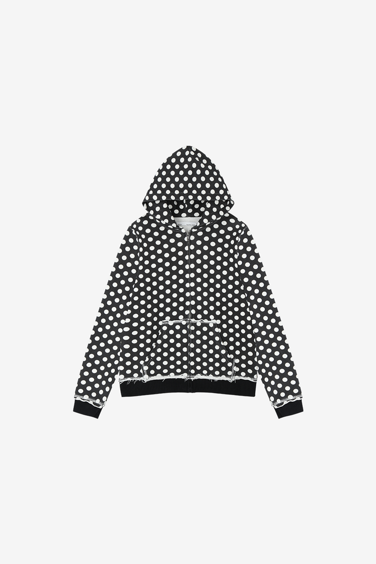 Black Polka Dot Slim Zip Hoodie front view laid flat, white dots with raw-edge seams