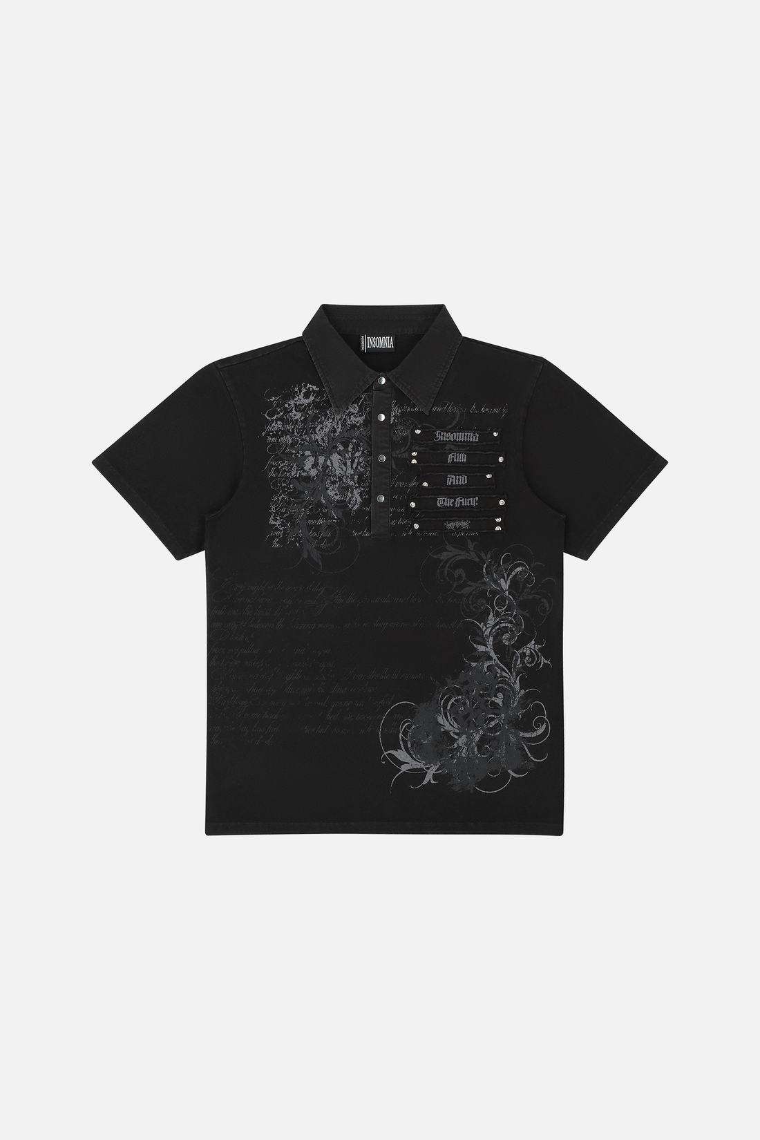 Black Thorns Polo laid flat, showing grey script and thorn print with studded chest detail