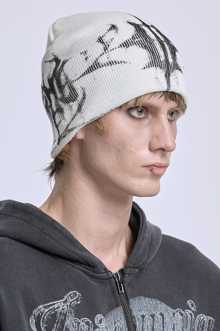 Side profile of the White Glitch Logo Beanie showing the black glitch pattern