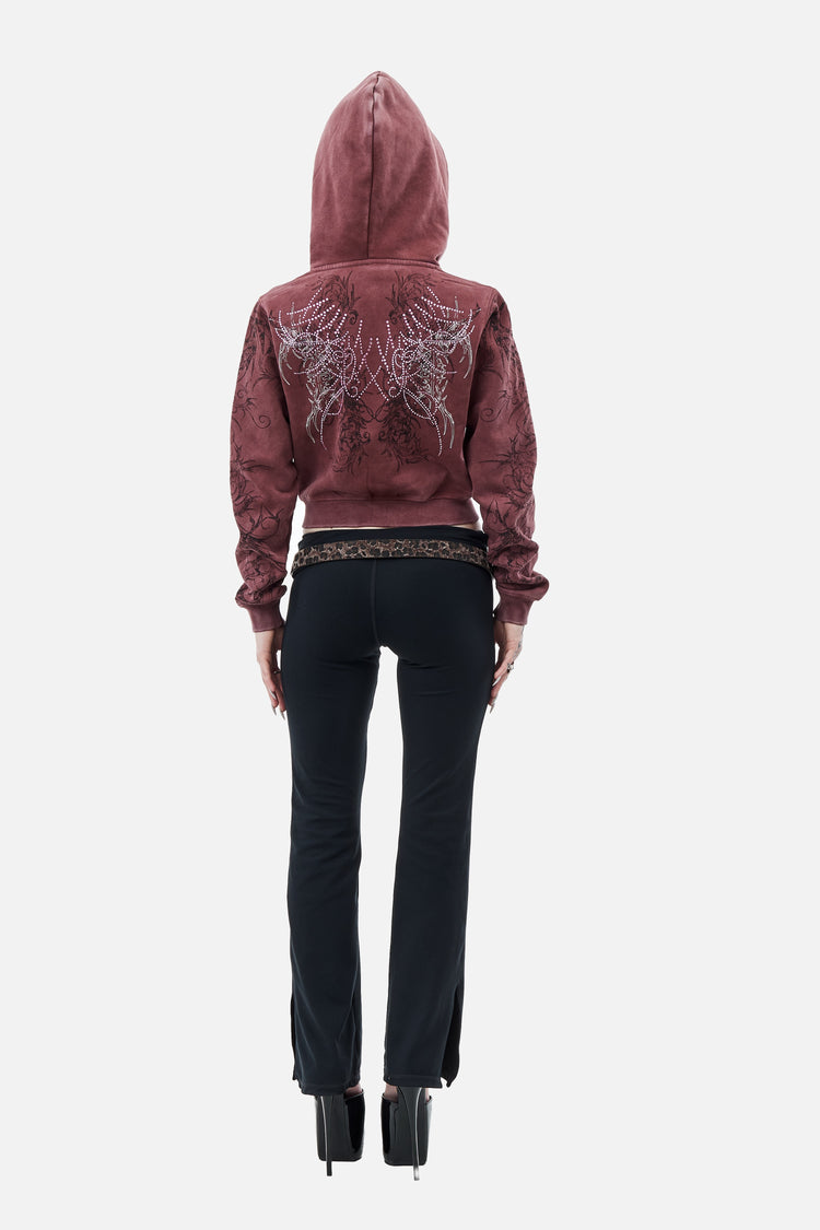 Full-length back view of the Fever Hoodie with hood up, showing the rhinestone wings