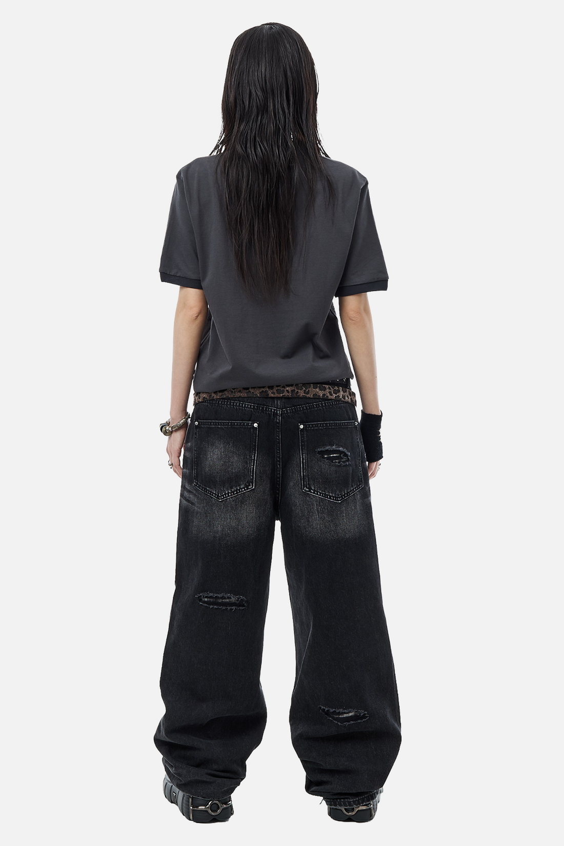 Back view of the Banished Polo styled with baggy black jeans, full length