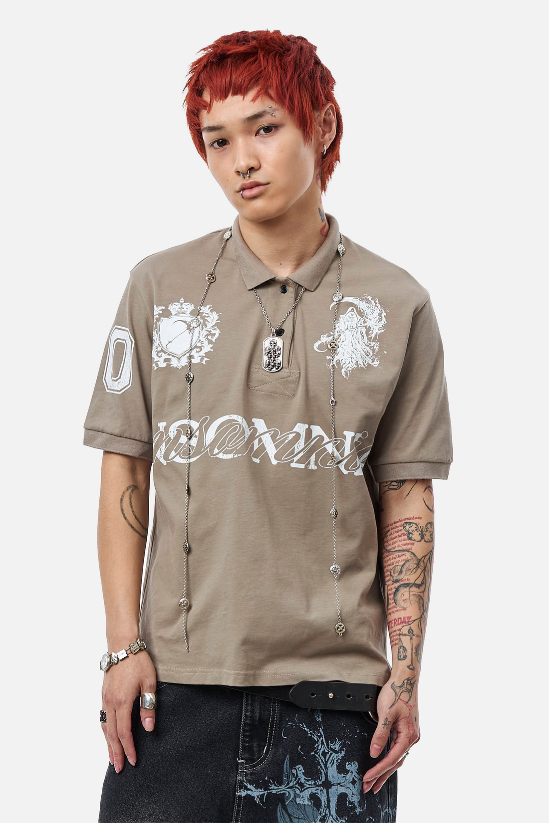 Model wearing the taupe Reaper Polo with silver Insomnia lettering and reaper graphics, front view