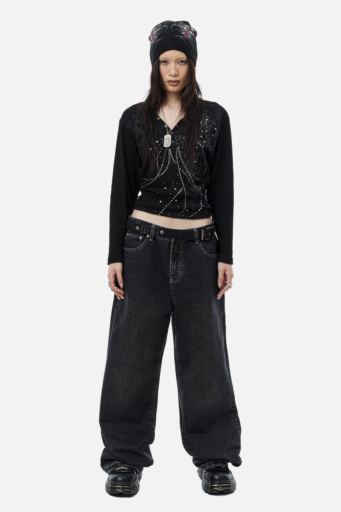 Full-length front view of the cropped Fate Ribbed Long Sleeve and wide-leg jeans