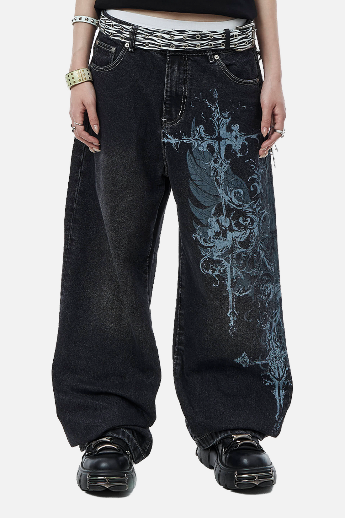 Front view of the black Winged Outlaw Denim with blue wing and cross print, worn baggy