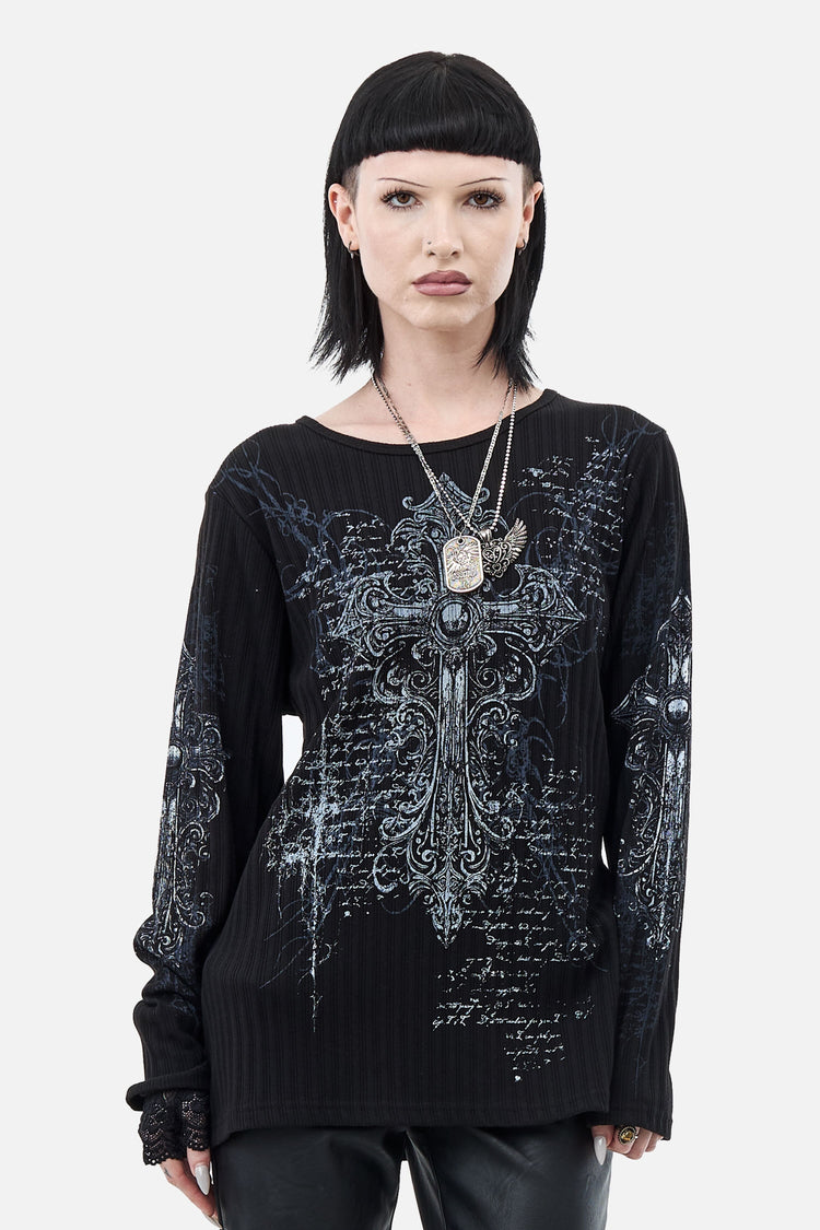 Model with a black bob wearing the Scripture Ribbed Long Sleeve with chain necklaces