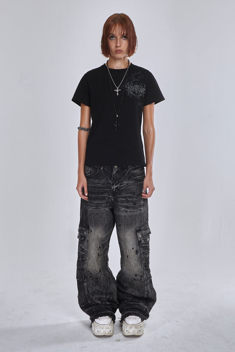 Model wearing the Fractured Denim with a black tee and white sneakers, full-length front view