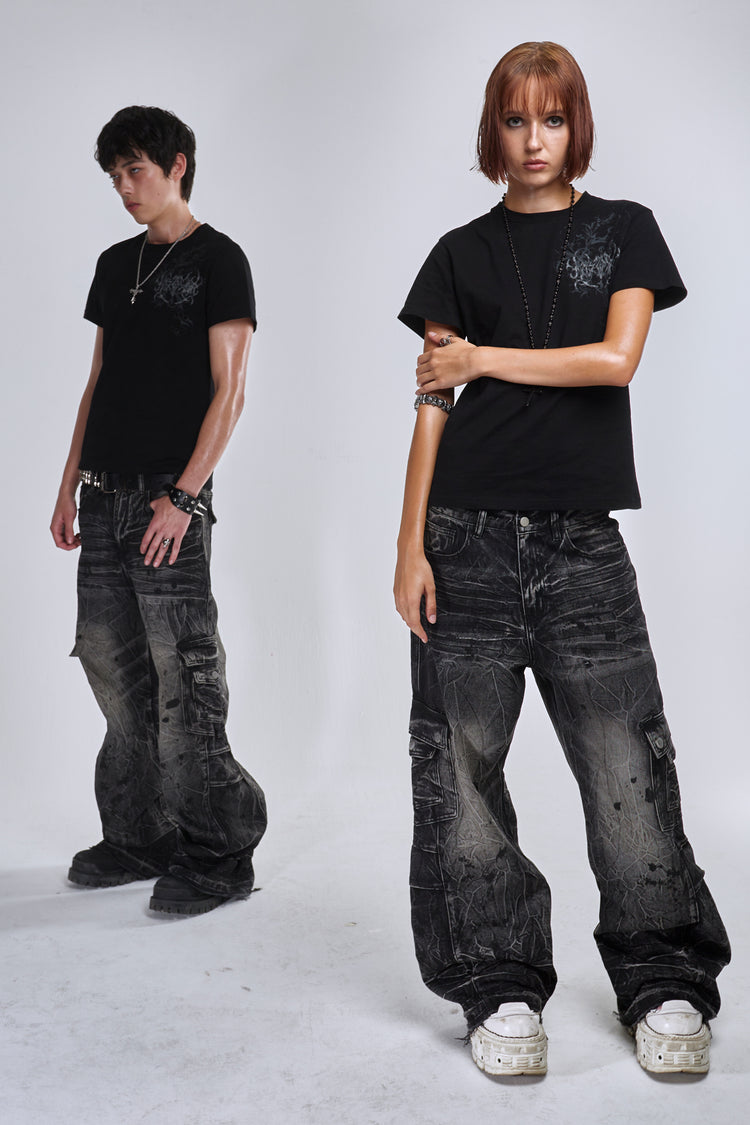 Two models in the Fractured Denim cargo jeans and black tees, standing side by side