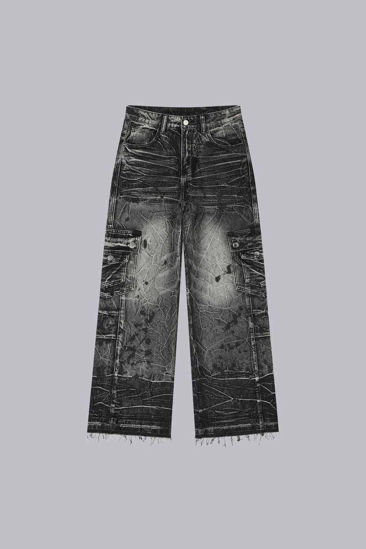 Fractured Denim laid flat, front view, washed black with cargo pockets and frayed hems