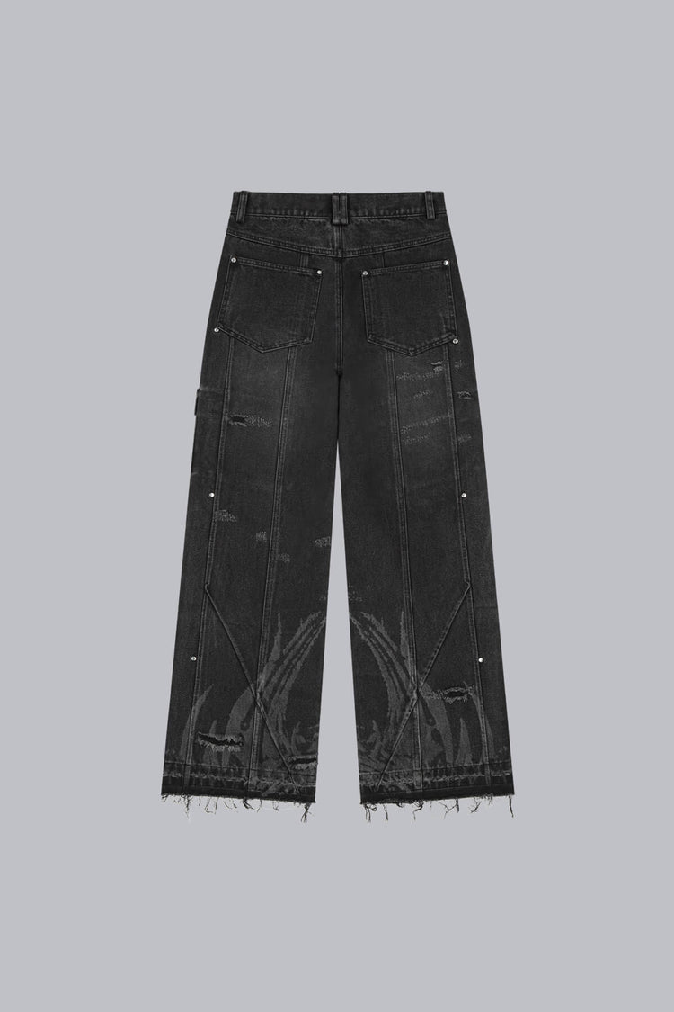 Back of the Destroyer Denim laid flat, with distressed knees and raw frayed hems