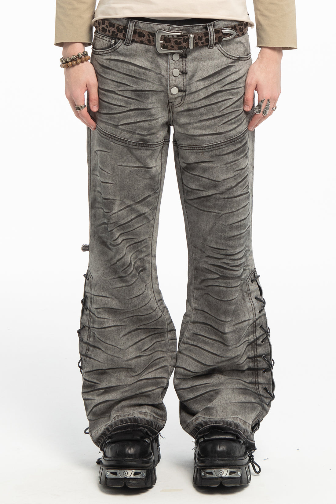 Cheetah Belt worn with grey crinkled flared jeans and black chunky boots, front view
