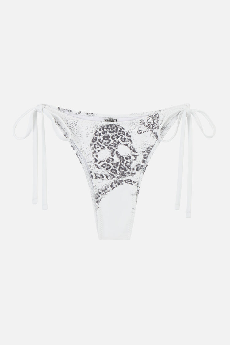 White Cheetah Skull Bikini Bottom laid flat, showing leopard skull and crossbones print with side ties