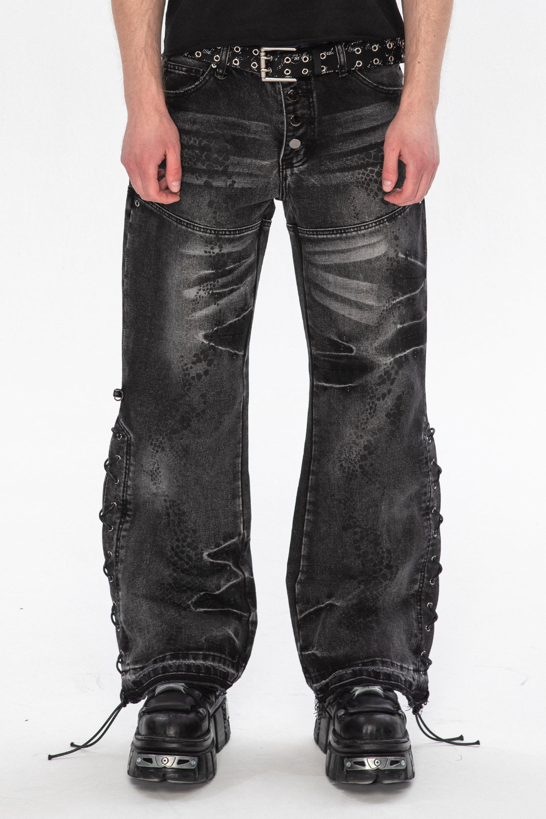 Front close view of the Snakeskin Flared Denim showing lace-up side seams and flared legs