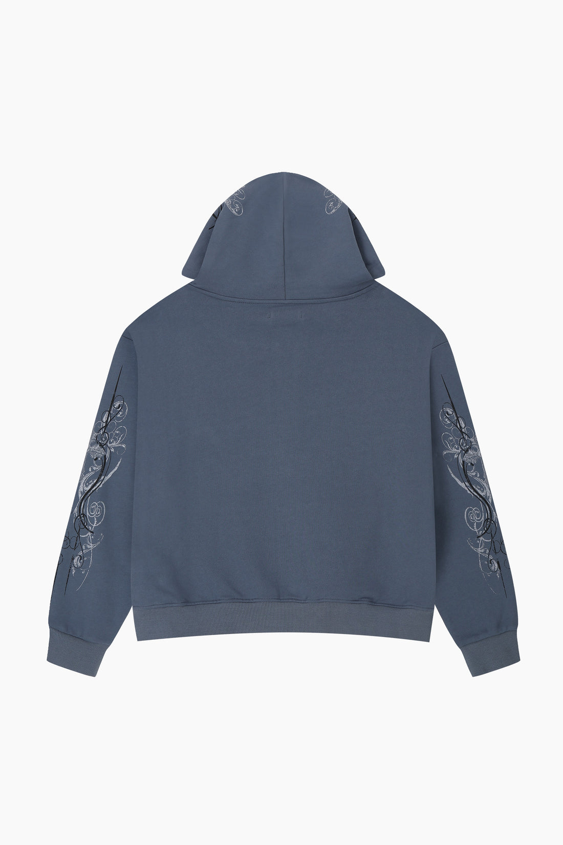 Back of the Midnight Blue Crux Hoodie laid flat, showing the scrollwork prints on both sleeves