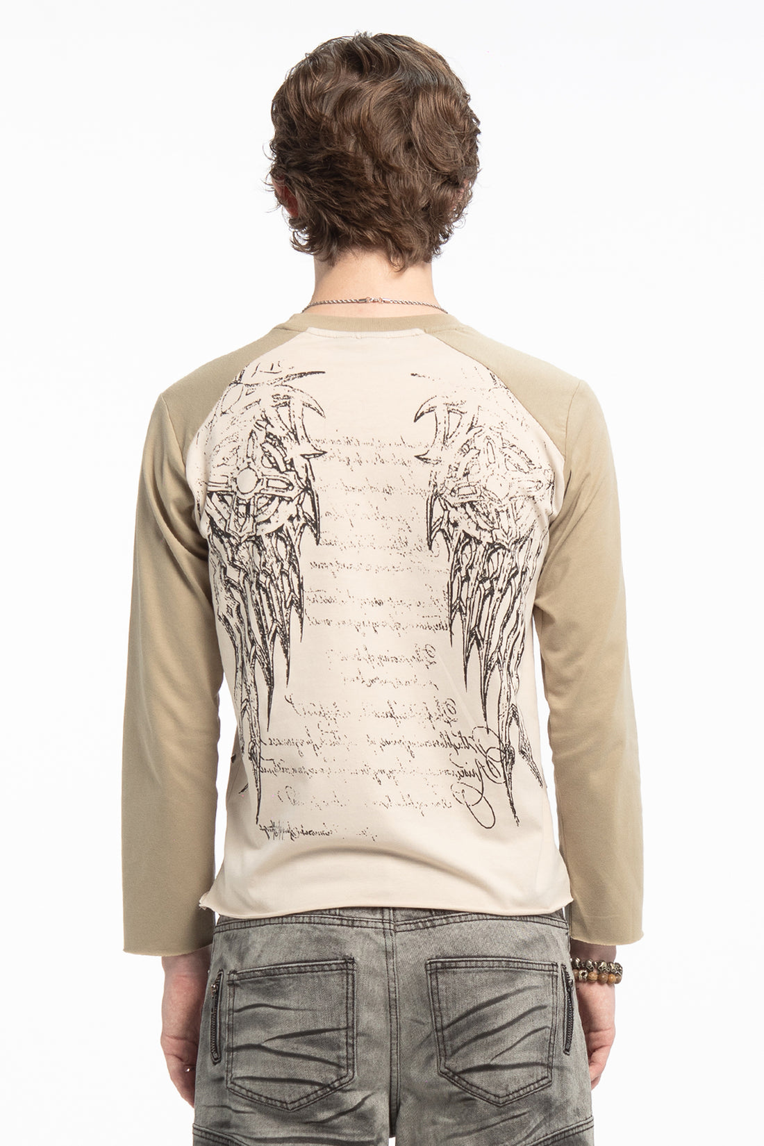 Back view of the Reaper Raglan Long Sleeve showing the large angel wings and script print