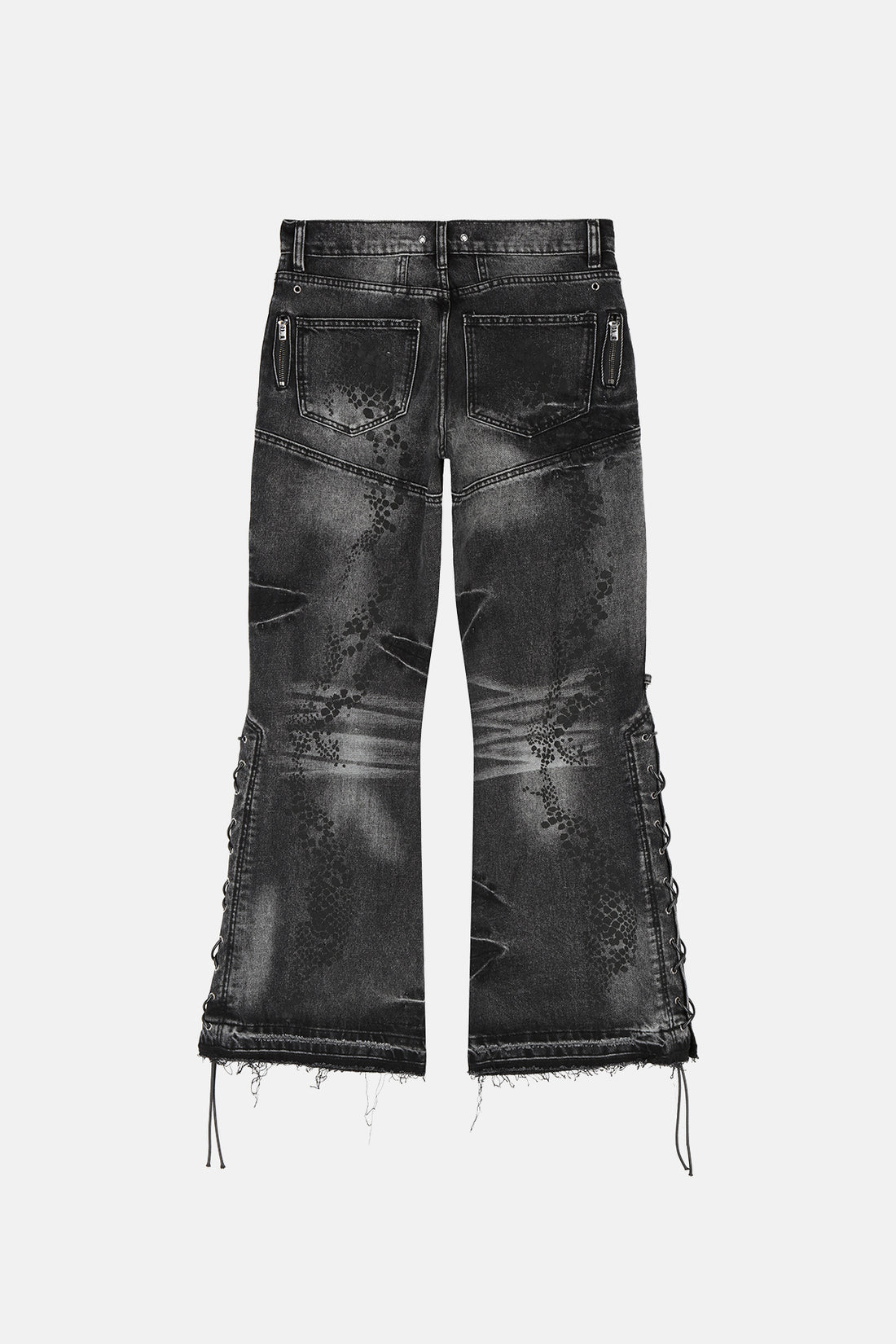 Back of the Snakeskin Flared Denim laid flat, showing faded wash and frayed hems